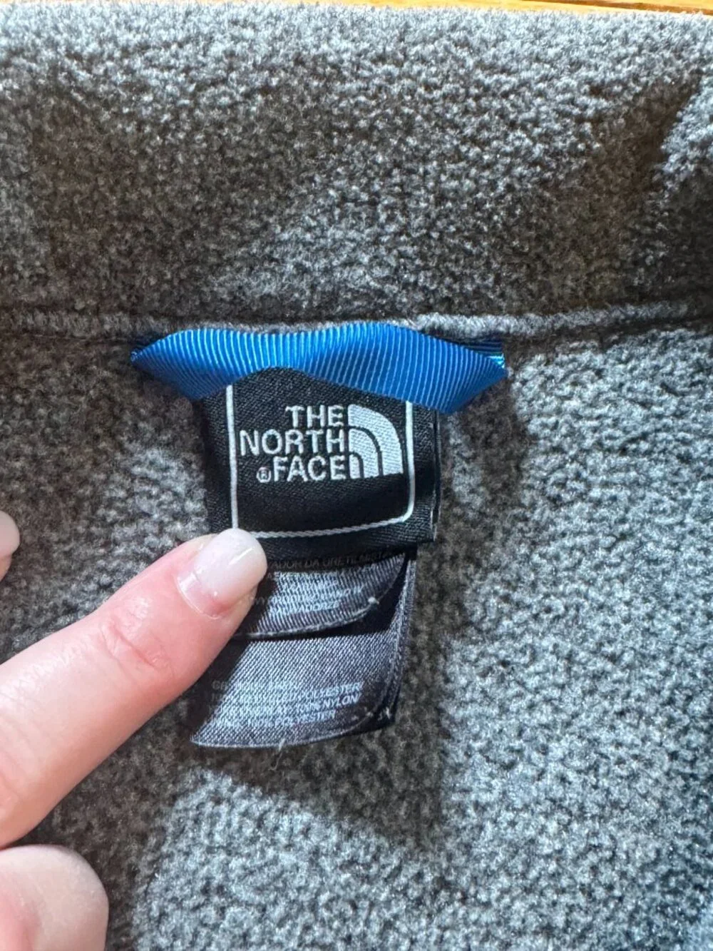 The North Face Black and Gray Jacket with Blue Accents